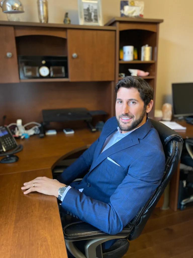 Kevin Mako, hardware startup consultant, seated in his office